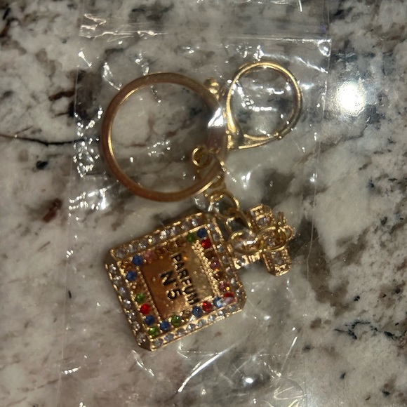 The Unbranded Brand Accessories - Perfume bottle key chain